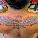 The Deep Meaning Behind Snake and Eagle Tattoos: Not Just Conflict, But Balance.