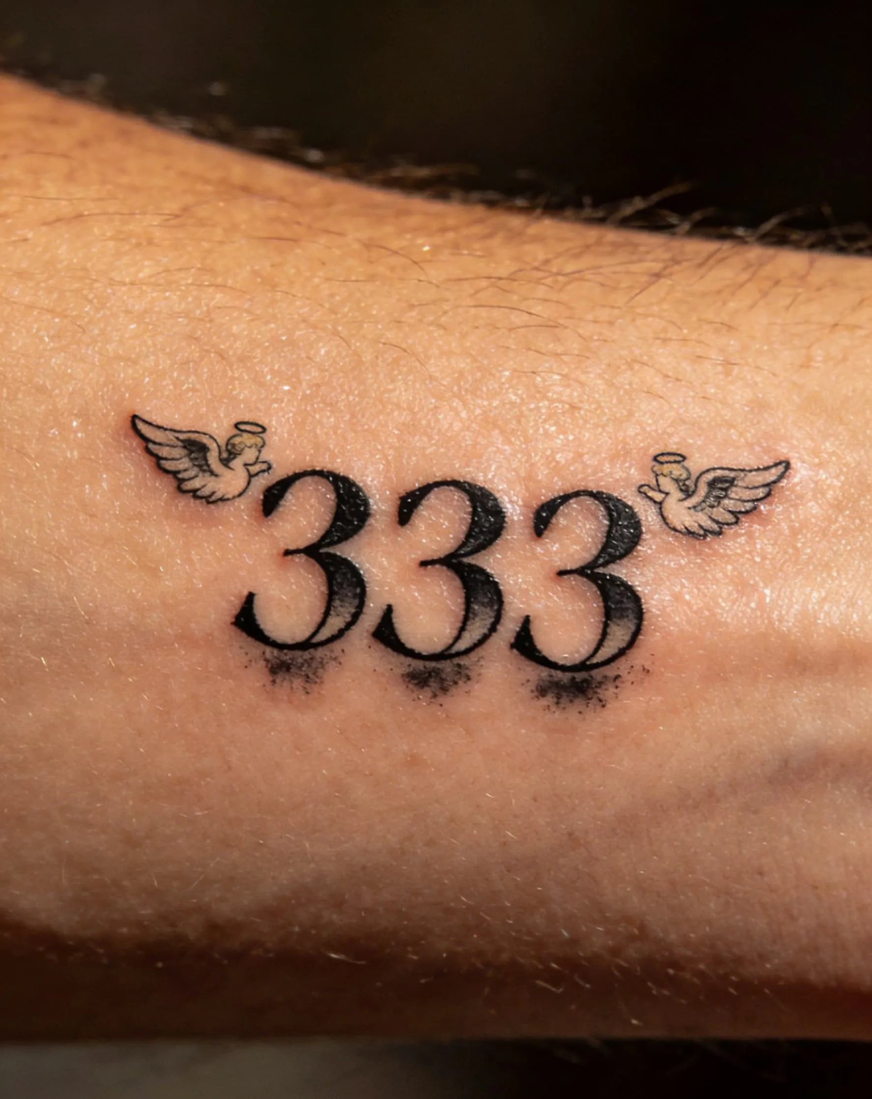 Angel Number Tattoo Meaning: Why People Tattoo 111, 444, and 999