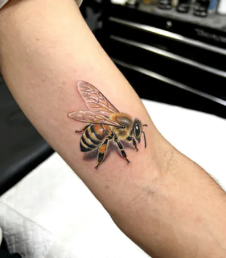 The Meaning Behind Bee Tattoos: Loyalty, Hard Work, and Powerful Symbolism