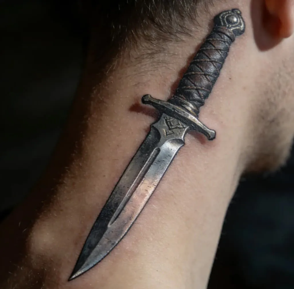 Dagger tattoo meaning with rose or heart: deep symbols of love and pain